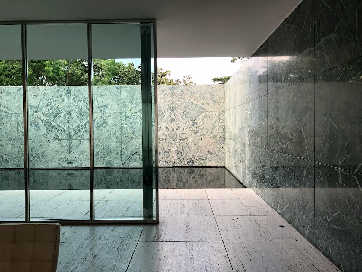 modern interior of the Barcelona Pavilion by Mies van der Rohe, emphasizing simplicity and elegance