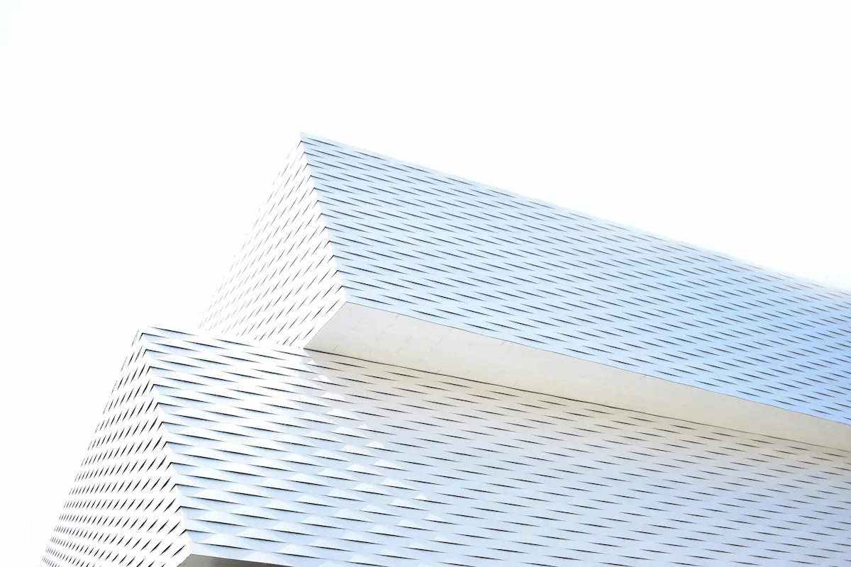 white building with geometric design in Basel, Switzerland, showcasing minimalist architecture