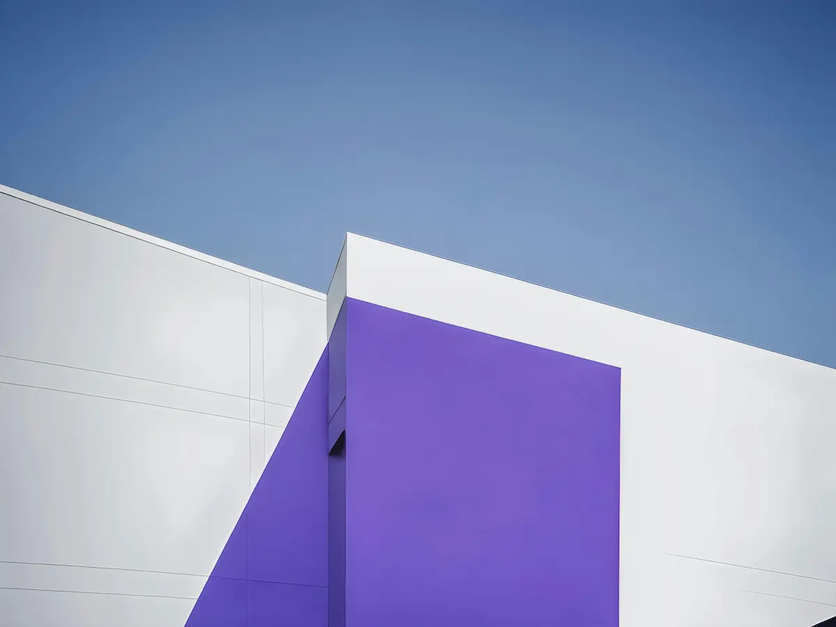 modern building close-up with minimalist design, bold accent color, and clean lines