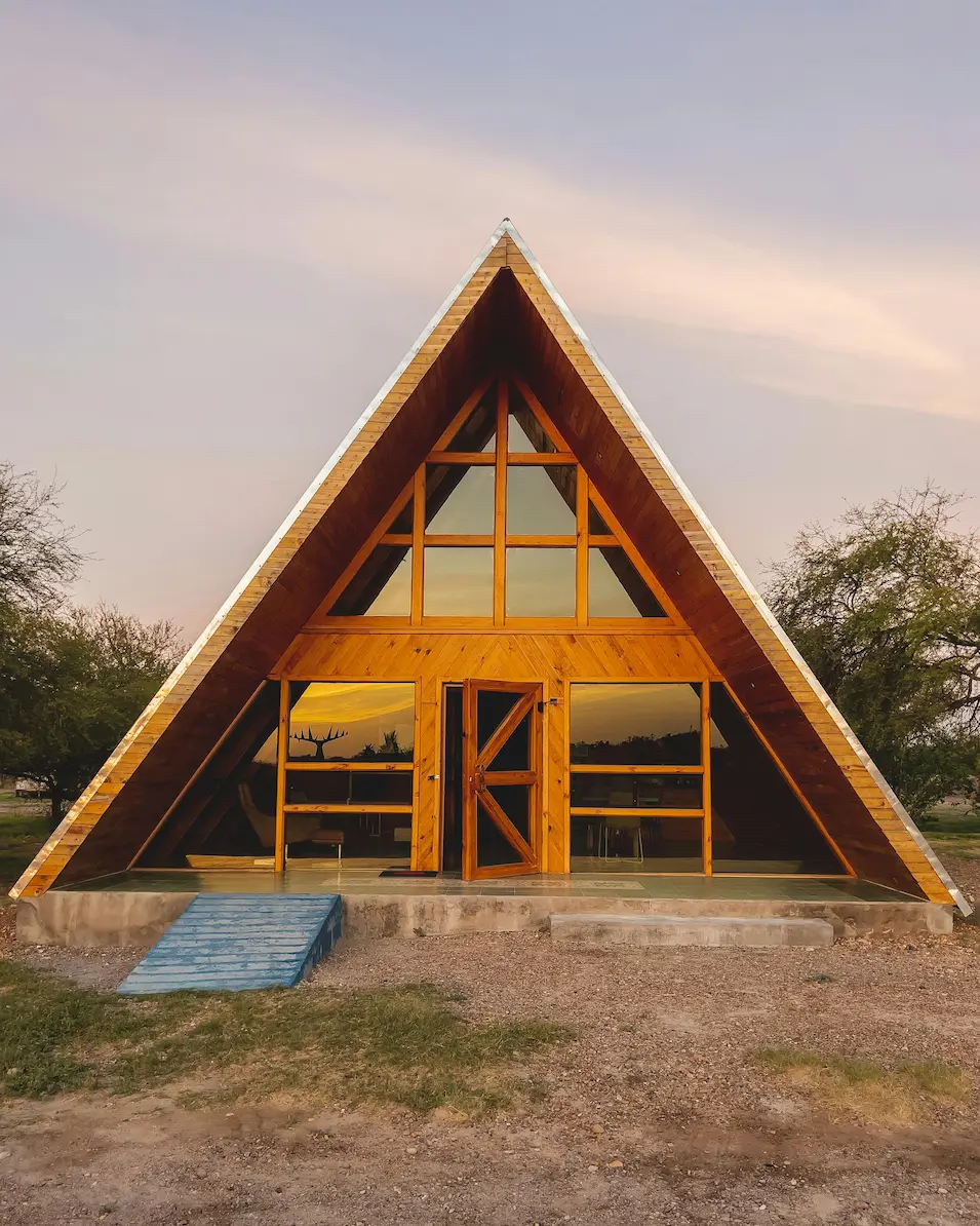 A wooden cabana with glass walls located in Guerrero, Coah., Mexico.