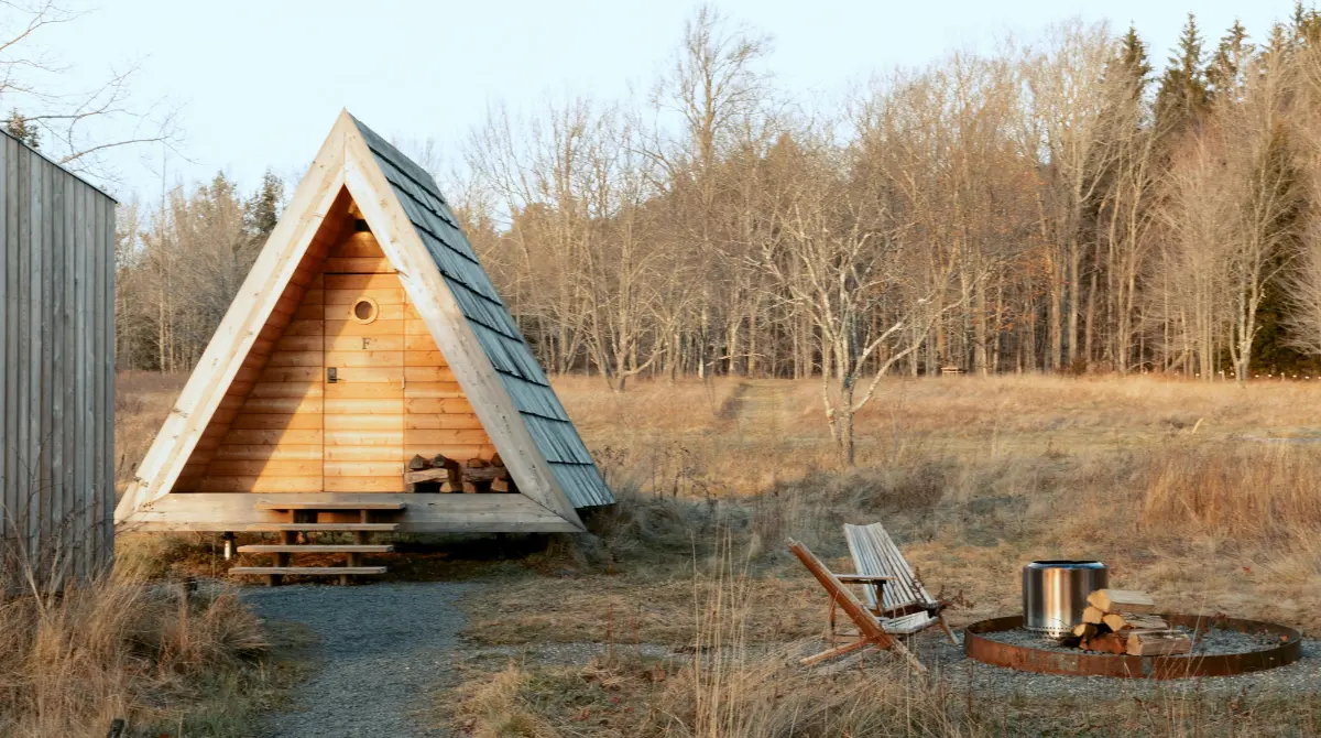 Wooden cabin located on the outskirts of a forest in NY, United States.