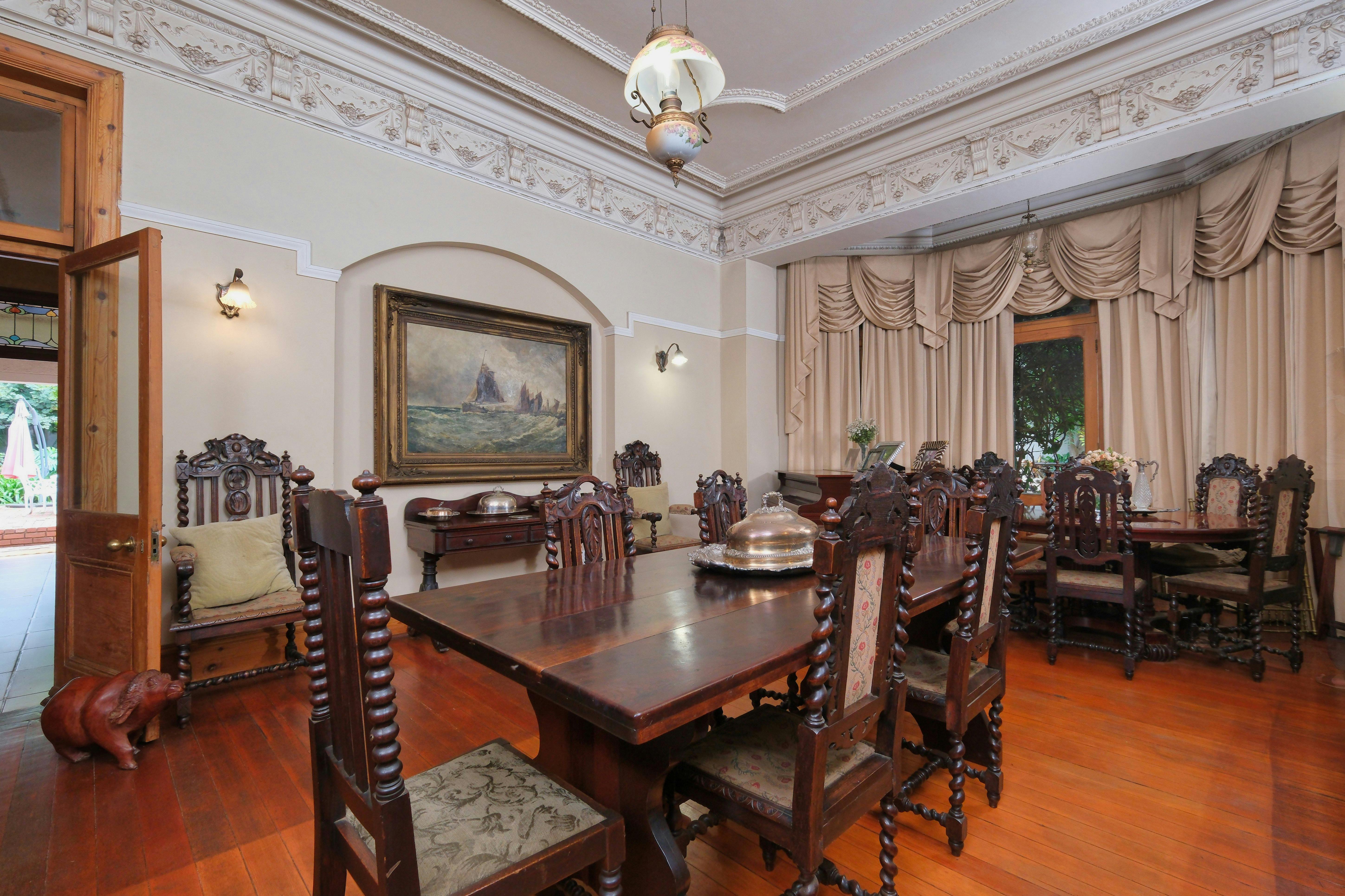Authentic 1940s dining area with a beautifully crafted original dining table.