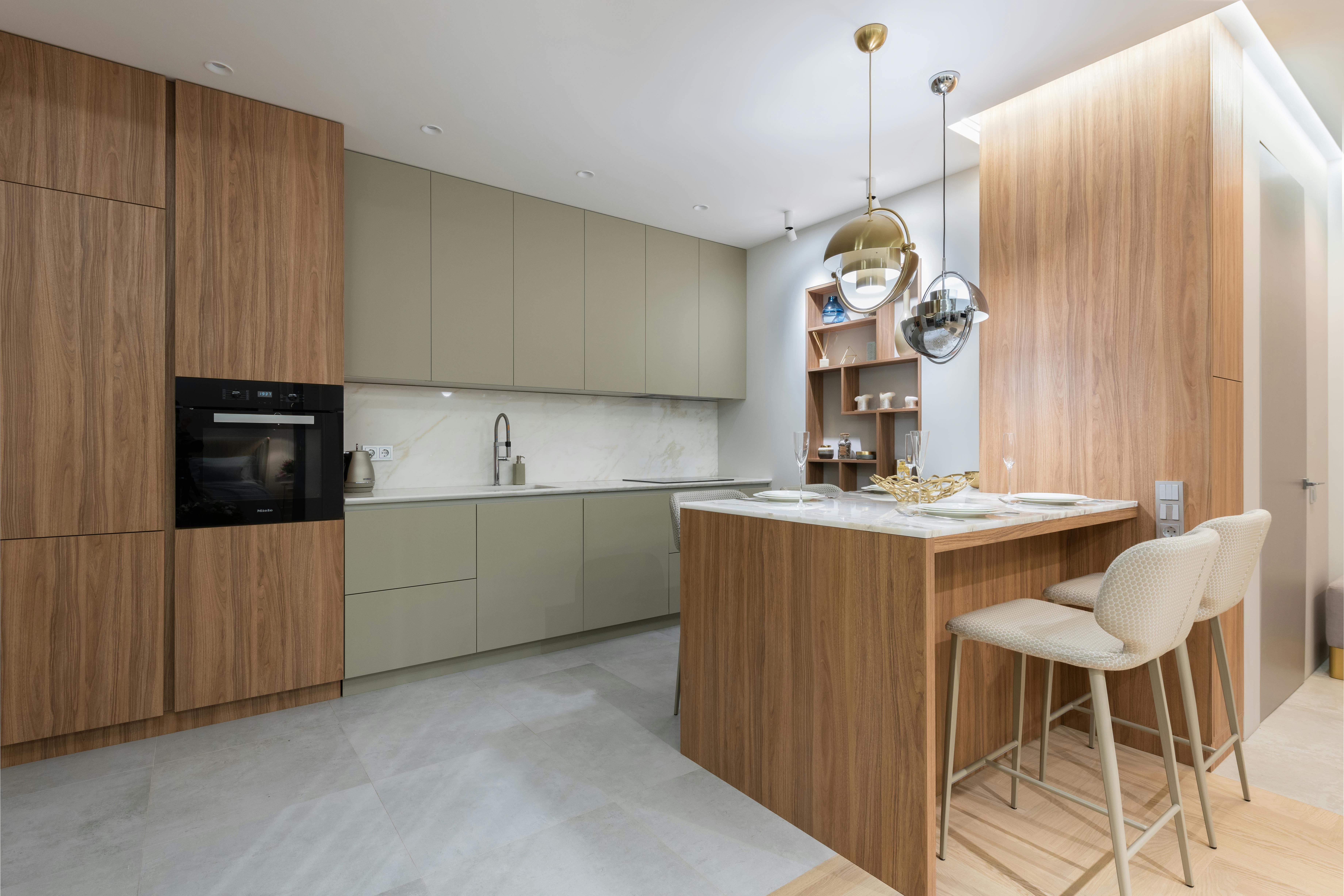 Contemporary kitchen with Behr Silver Drop on the walls, a soft gray that complements the sleek, modern design.