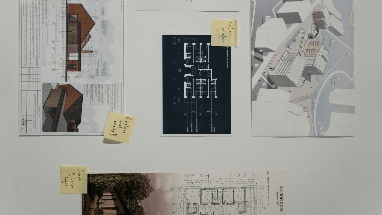 Board displaying housing design concepts, marking the beginning phase of residential architectural planning.