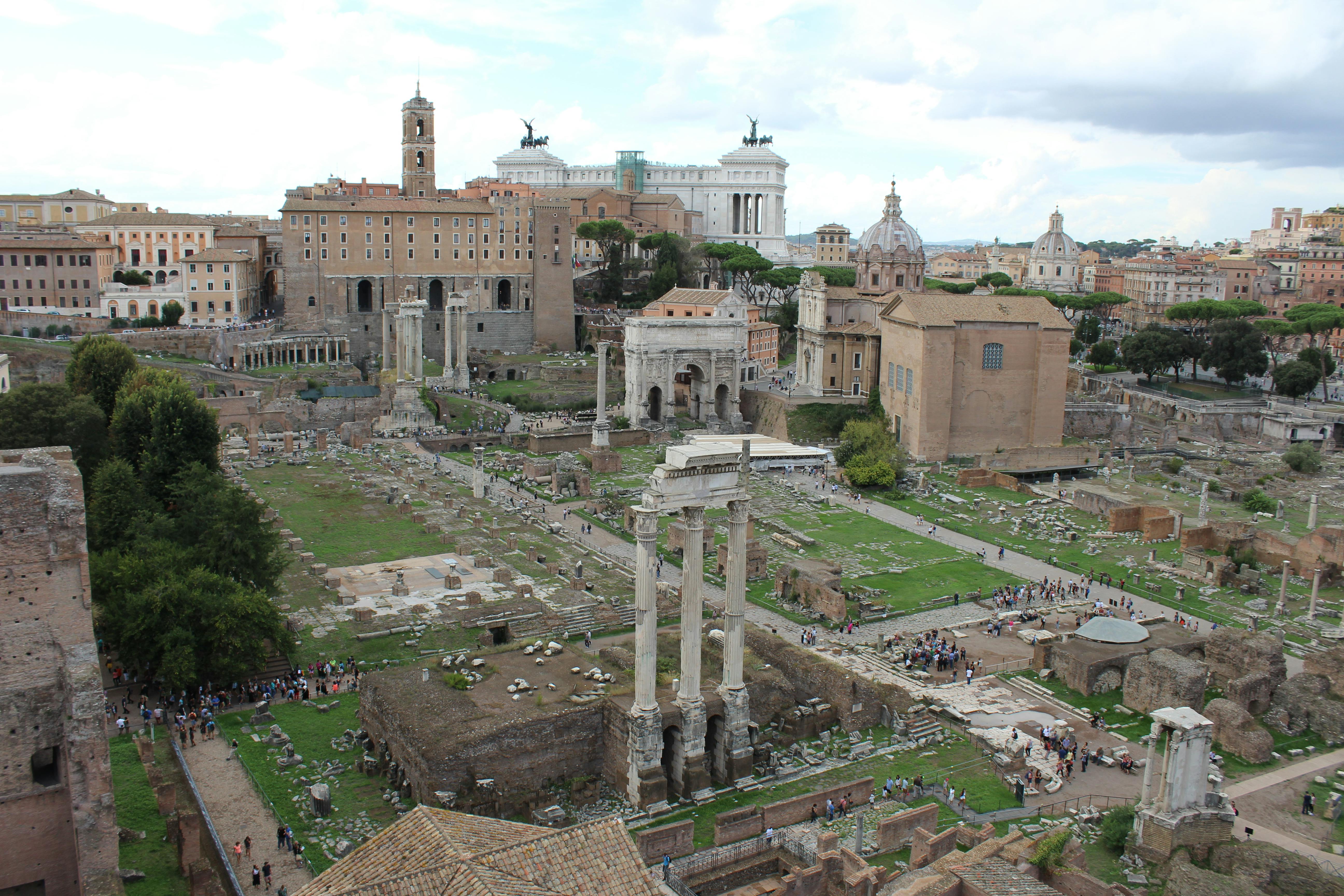 Aerial view of ancient Roman ruins showcasing arches and construction techniques.