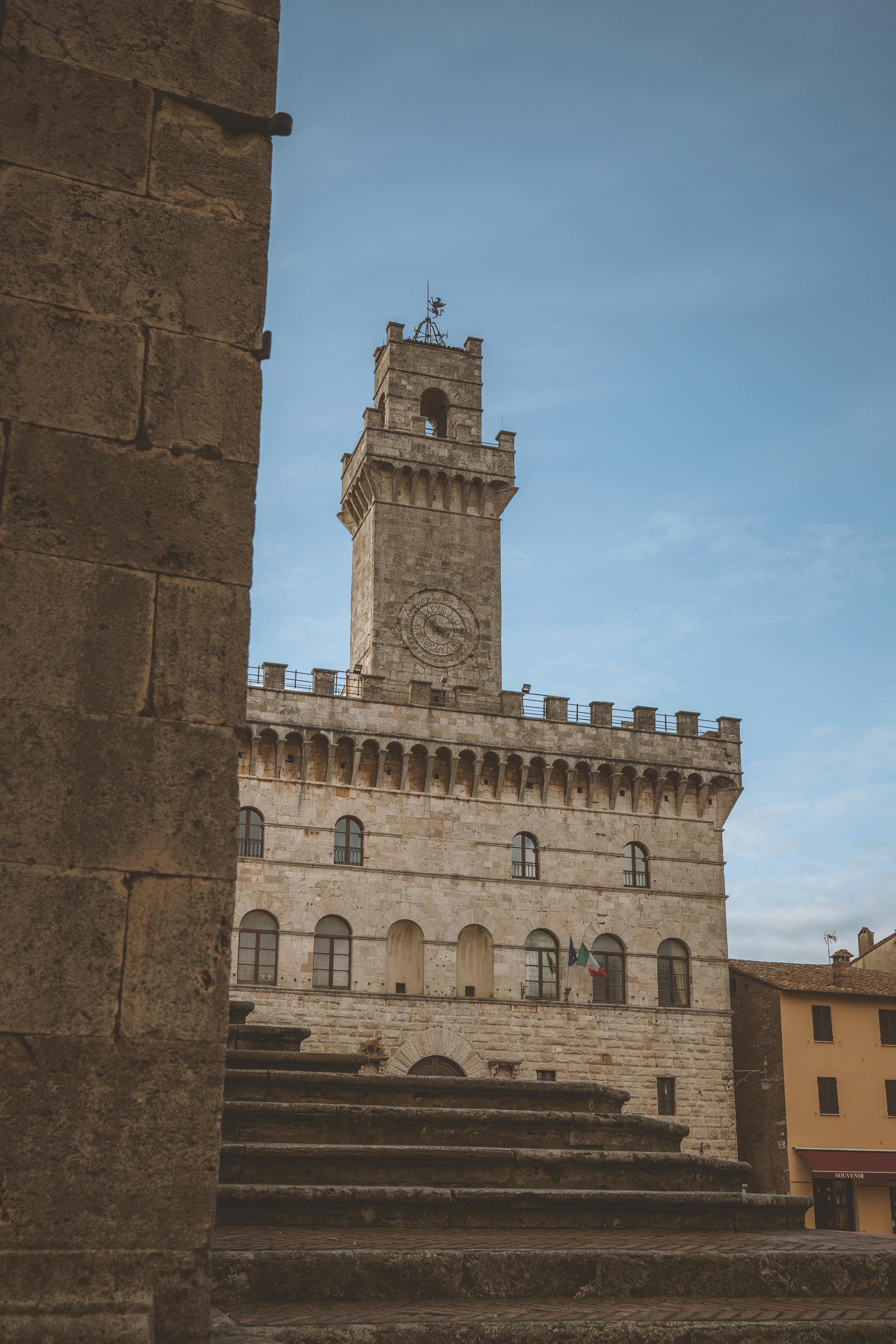 Medieval castle with towers and moat in Ferrara, Italy.