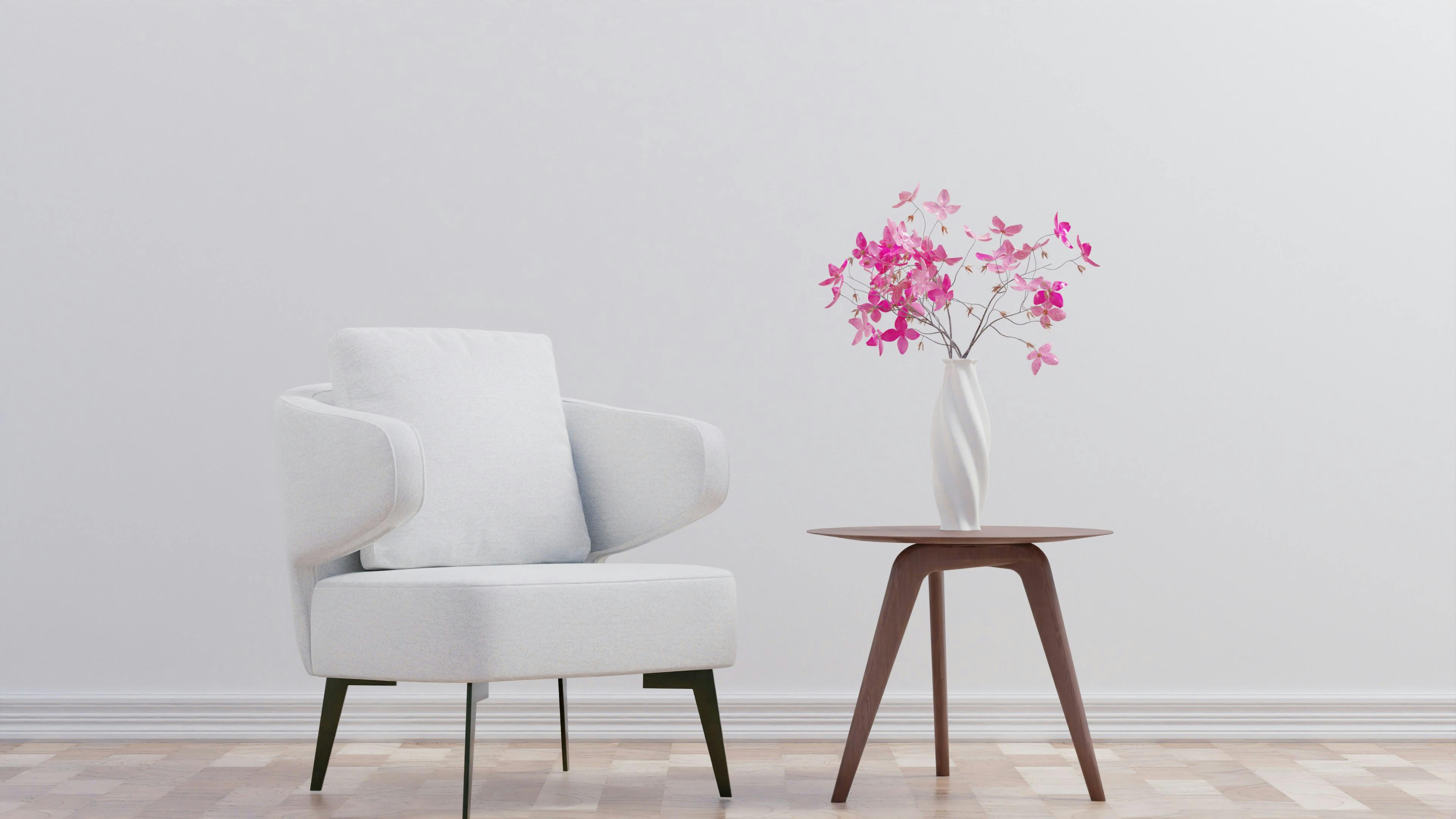 Minimalist living room with carefully chosen furniture that balances scale, comfort, and style in a clean, elegant space.