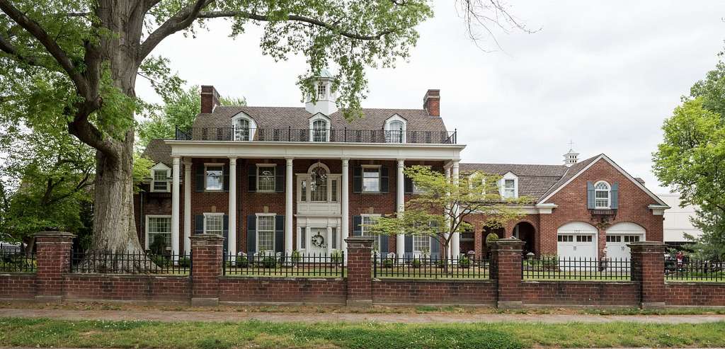 Brick-style Henry Oates House (1940–43), inspired by Mount Vernon, located in Parkersburg’s Market Street neighborhood.