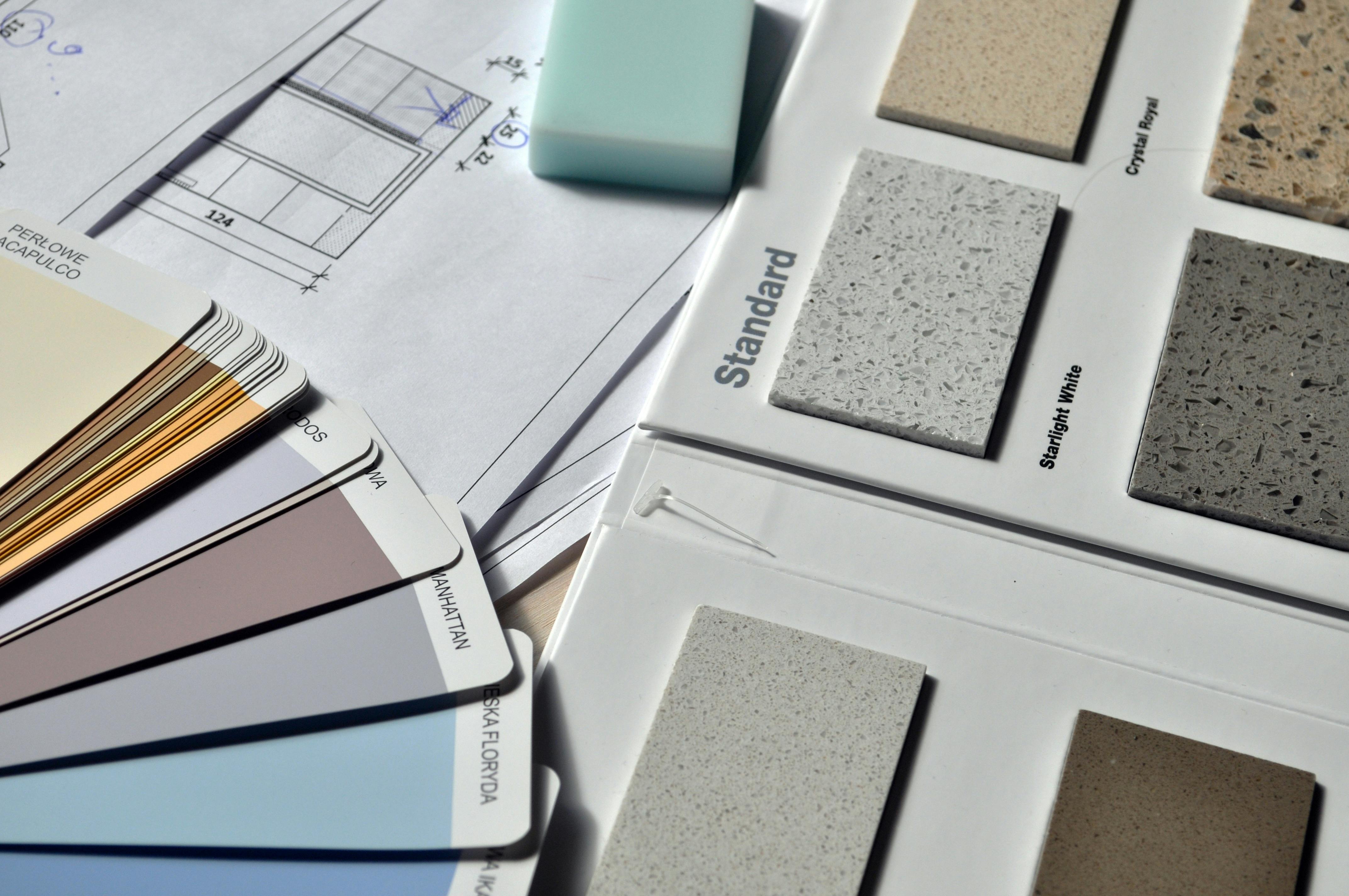 Professional interior design sample board with fabric swatches and material samples.
