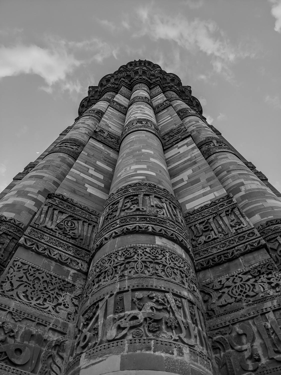  Quranic inscription and carving details on Qutub Minar.