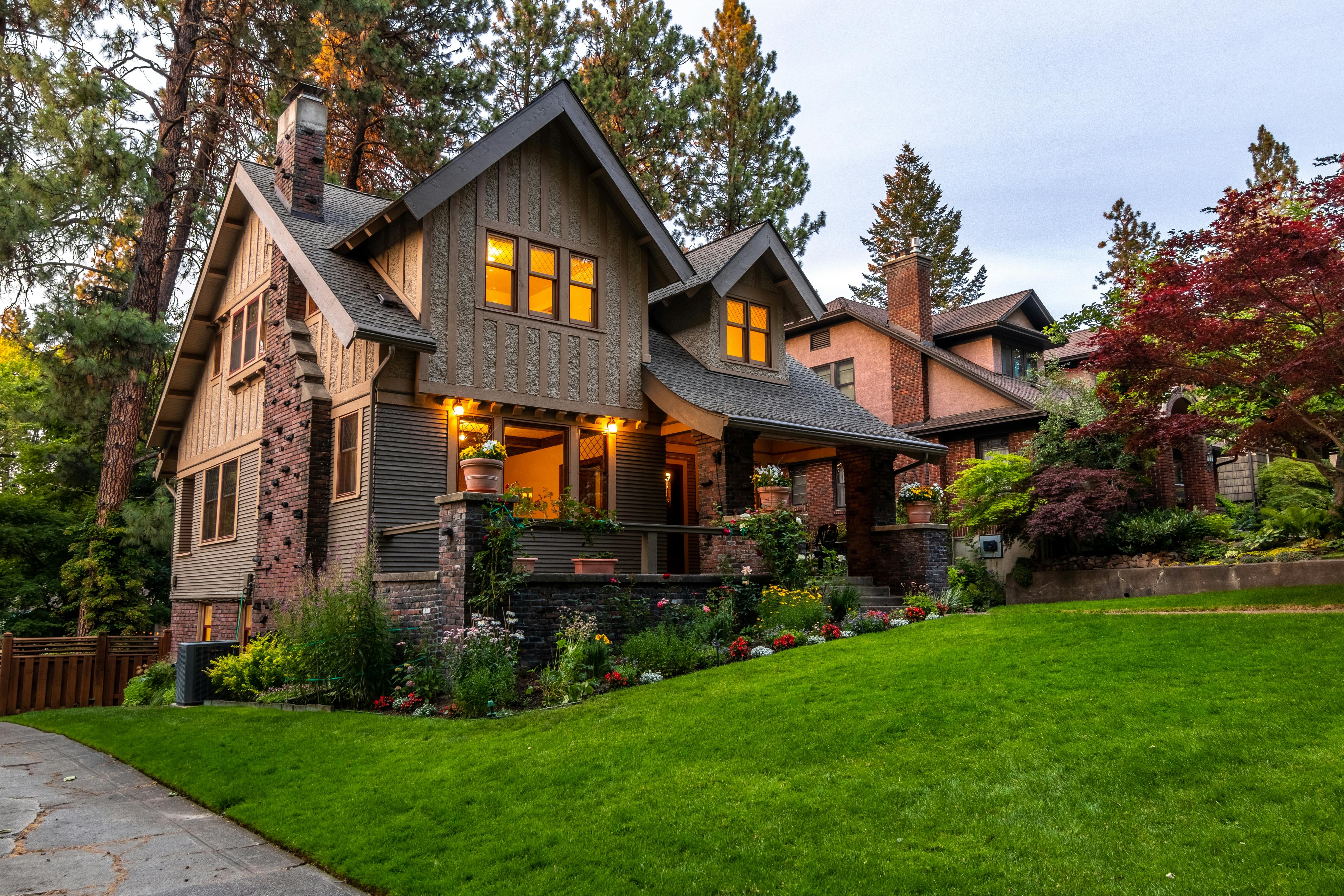 Traditional multi-level house with brown stone exterior built to withstand the elements.