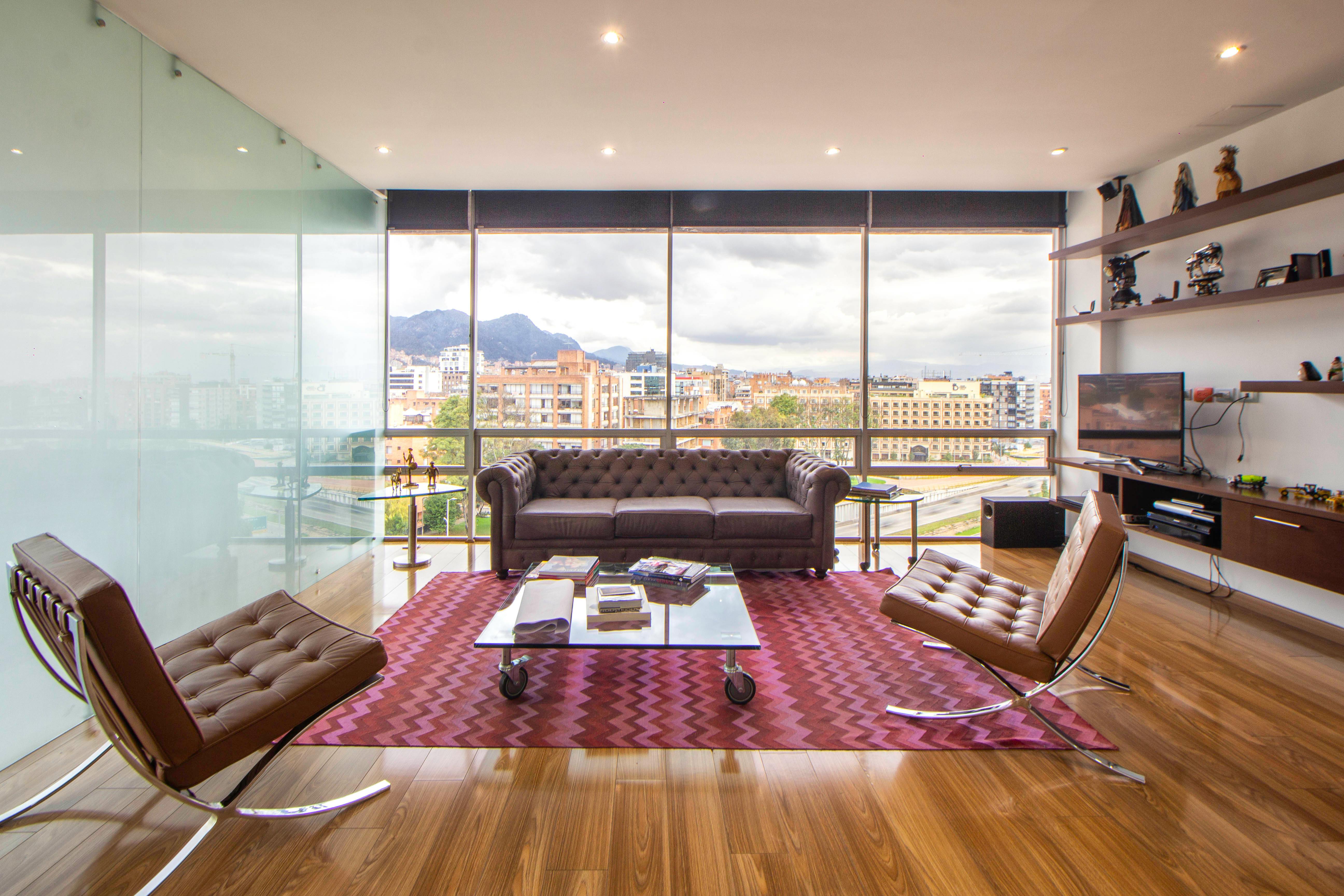 Modern floor-to-ceiling glass window design.