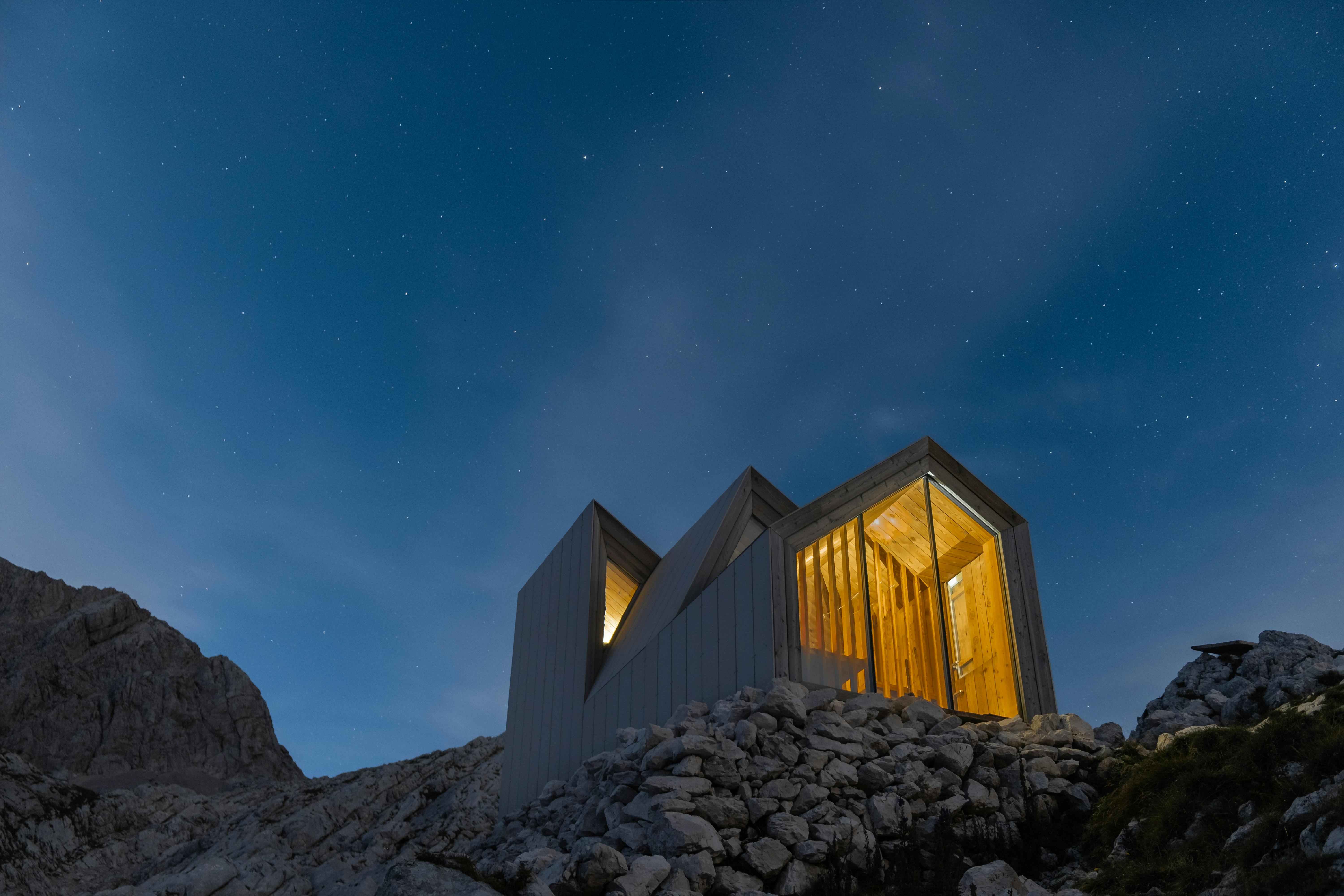 Minimalist cabin on rocky terrain near Kranj, Slovenia.