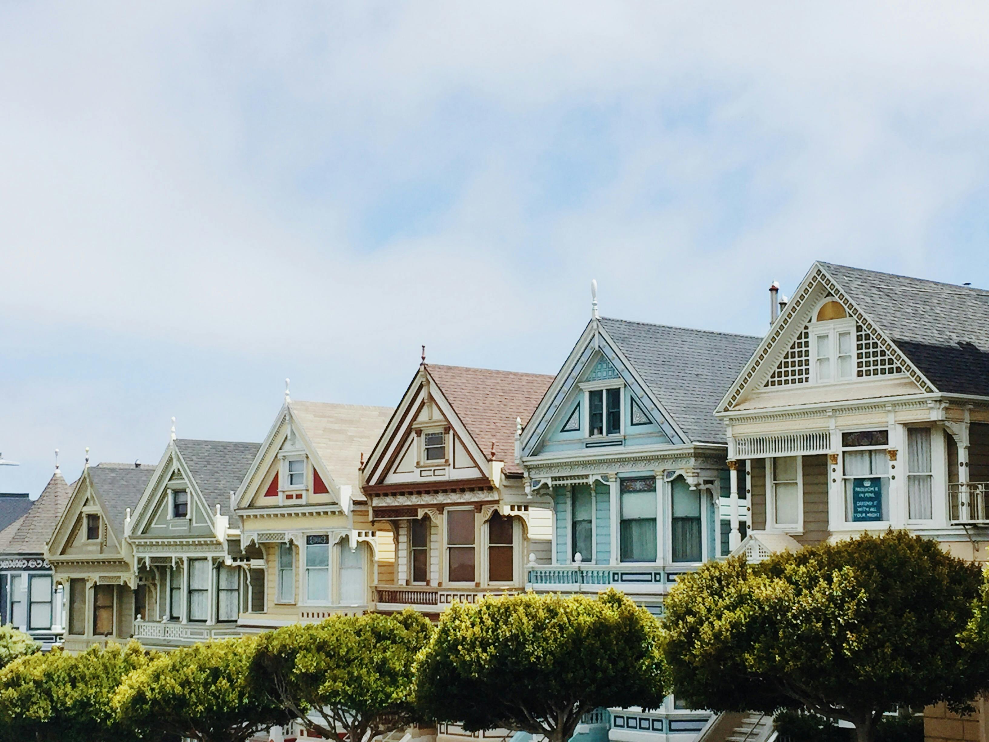 Row of Victorian Painted Ladies houses with distinctive colorful facades.