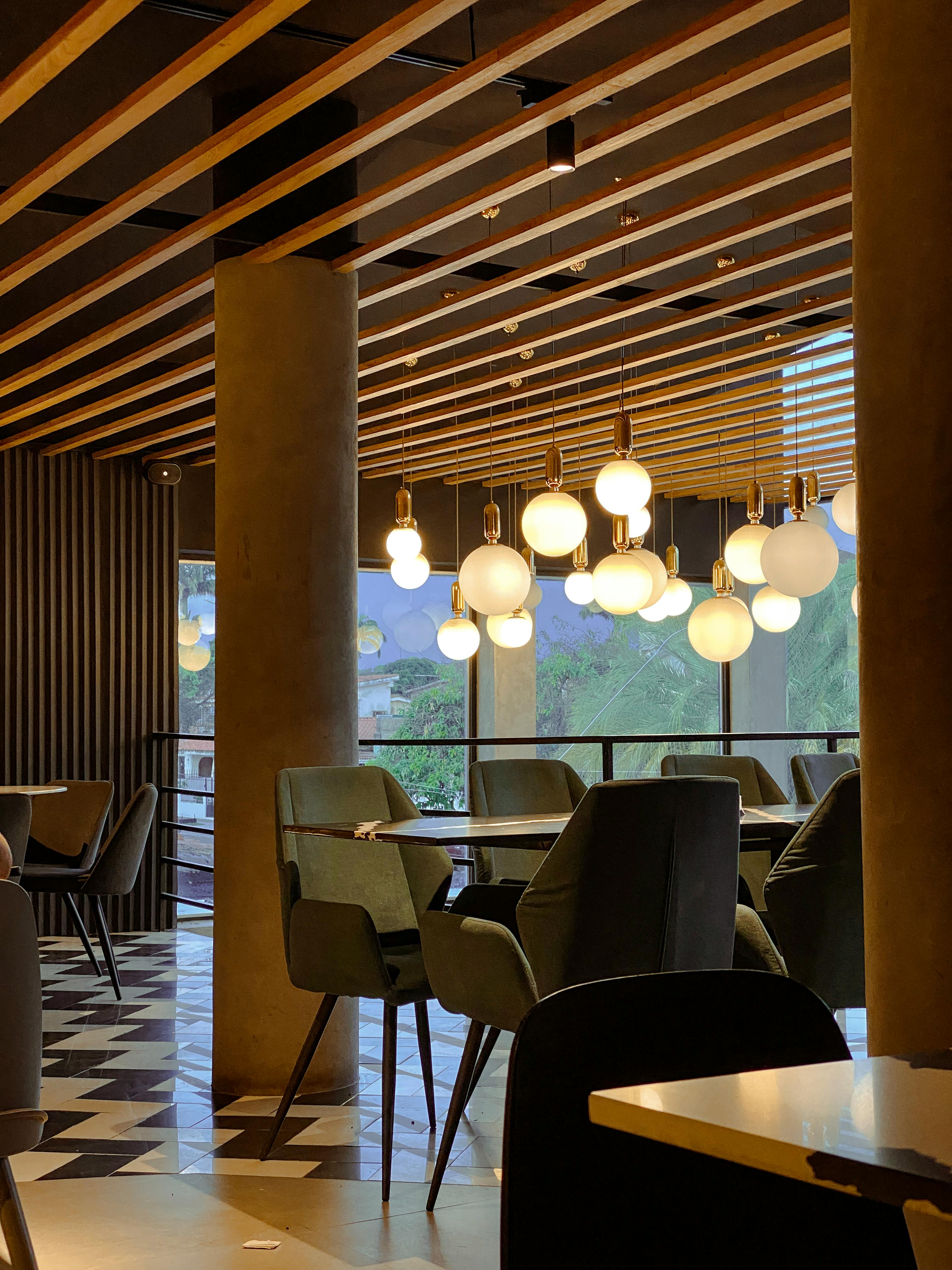 Brown-themed restaurant with wood ceiling panels.