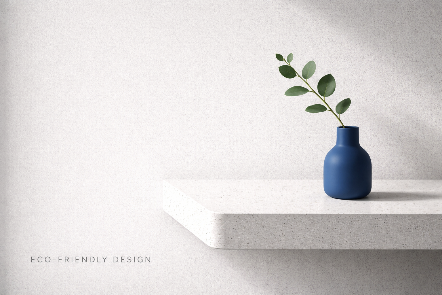 Eco-friendly interior design with terrazzo shelf, cobalt vase, and soft daylight on neutral wall.