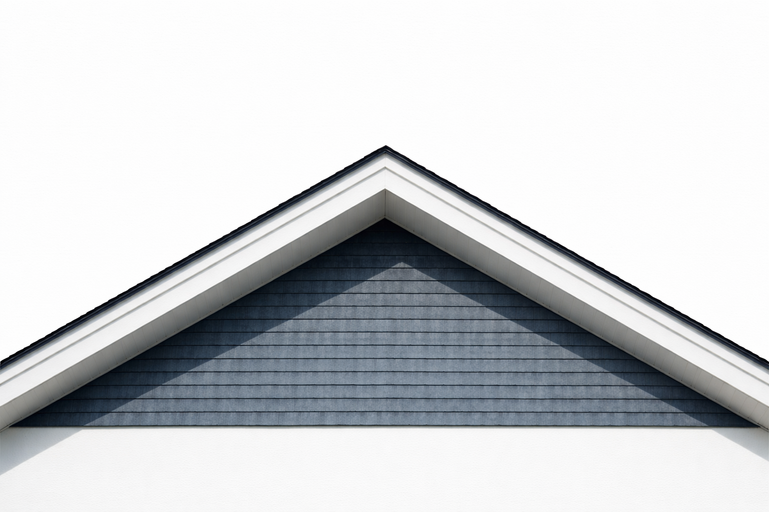 Gable roof peak detailed materials showing ridge line, bargeboard, and shingle courses.