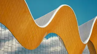 Modern architectural example using parametric design with curved geometry.