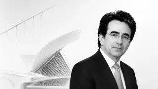 Black-and-white editorial portrait for a Santiago Calatrava architecture article, with a faint sculptural structural building in the background.