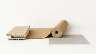 Cross-section view showing floor structure layers including insulation, vapor barrier, and surface finish.