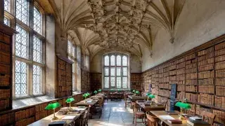 Gothic interior with pointed arches, vaulted ceiling, and long reading-room character.