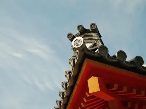 Decorative roof and chimney trim in Kyoto, showcasing intricate details.