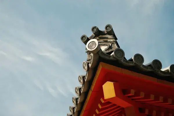 Decorative roof and chimney trim in Kyoto, showcasing intricate details.