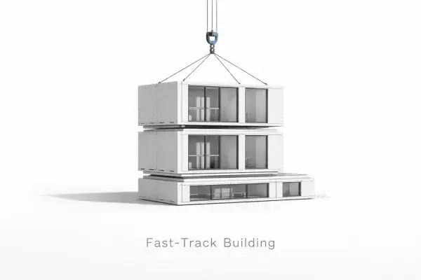 Prefabricated modular unit being set by crane onto a stacked module base during construction.