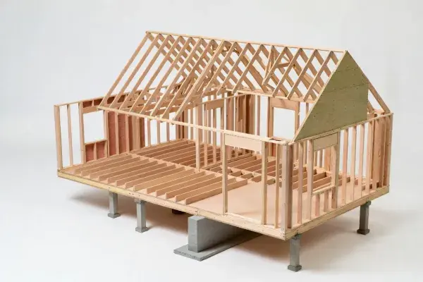 Diagonal roof bracing installed across timber rafters during residential house construction.