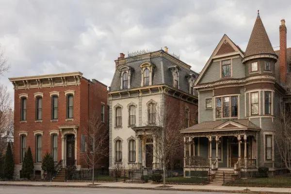 Italianate, Second Empire, and Queen Anne houses showing three Victorian architecture styles.